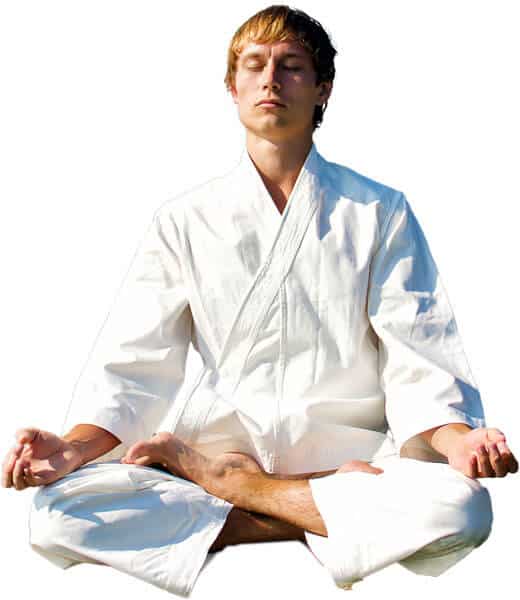 Martial Arts Lessons for Adults in Dothan AL - Young Man Thinking and Meditating in White